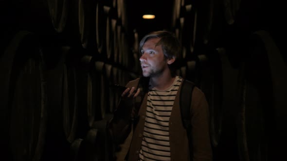 Old Wine Barrels in a Wine Cellar Sommelier Man Tourist Dicover Porto Portugal Old Factory Stock