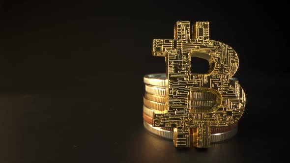 Gold Bitcoin with Many Orher Crypto Coins in the Table