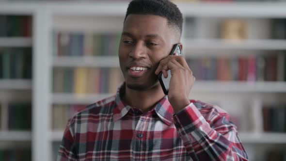 Portrait of African Man Talking on Smartphone