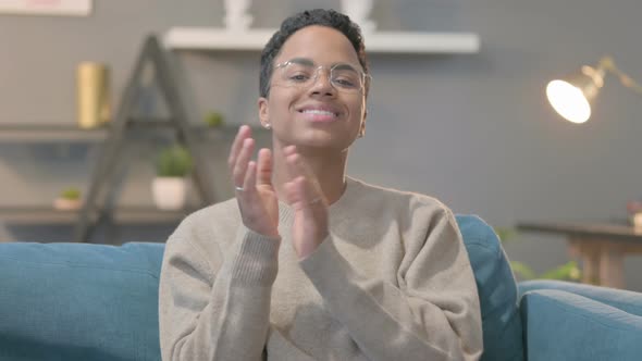 Portrait of Happy African Woman Clapping Applauding