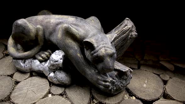 Statue of a Sleeping Panther, Scenery in a Restaurant.