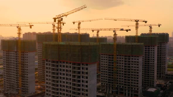 Aerial of construction site at sunset