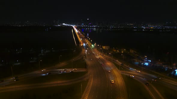 Transport Interchange Near Paton Bridge, Kyiv, Ukraine. Night Traffic Aerial View