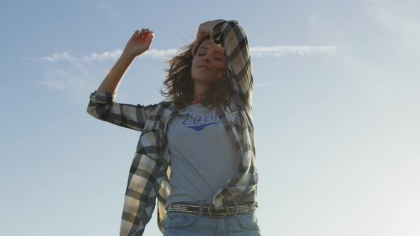Girl enjoying a sunny day alt