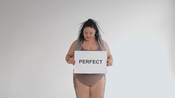 Happy Fat Woman in Underwear with Drearlocks Holding Body Positive Poster