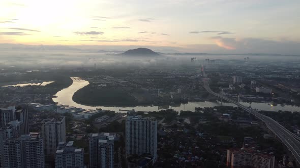 Aerial move toward Sungai Perai near Bagan