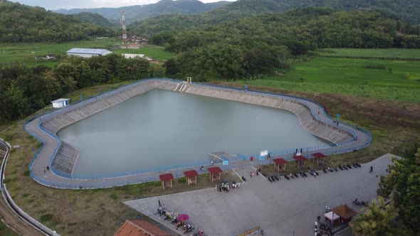 Aerial view of a pond with a puppet-like shape in the Bantul area, Yogyakarta