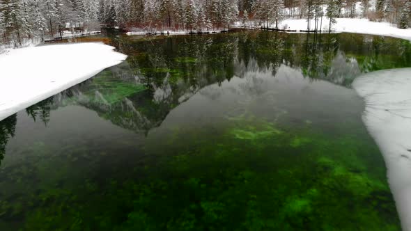 Beautiful view on an Lake with Mountains in Schiederweiher in Upper Austria Drone Video