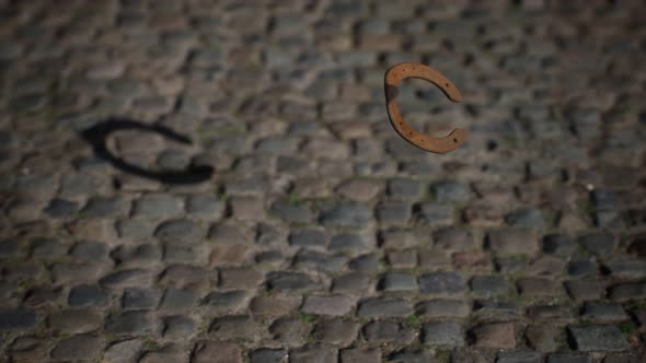 Extreme Slow Motion Old Rusty Metal Horseshoe