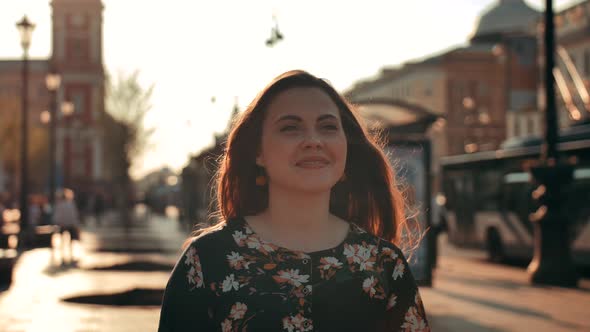 Charming Brunette Woman Running To Hug Her Boyfriend at Urban Street.