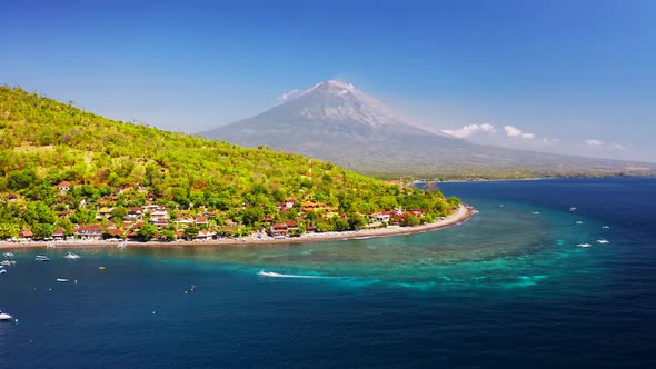 Tropical Mountains Landscape with Boats and Turquoise Sea Water on Jemeluk Bay, Amed, Bali