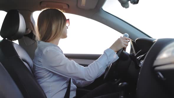 Business Woman Driving Car