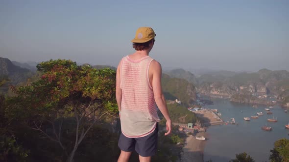 Man Having Fun Looking At The View In Catba island in Vietnam - Perfect for Summer Vacation - Aerial