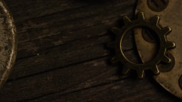 Rotating stock footage shot of antique and weathered watch faces 