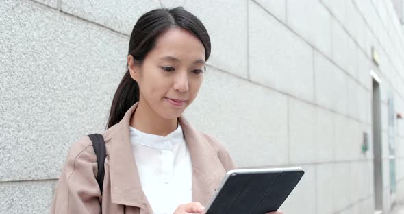 Woman Use of Tablet Computer at Outdoor