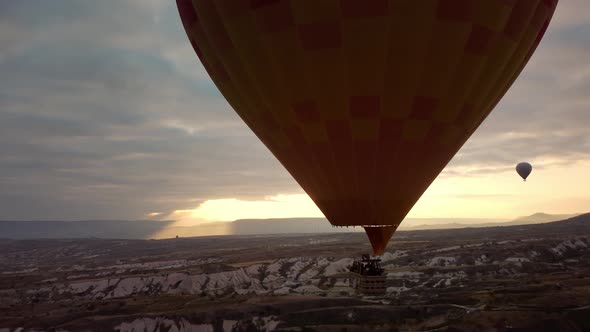 Tourists Having Excursion on Hot Air Balloon and Enjoying Views of Turkish Nature