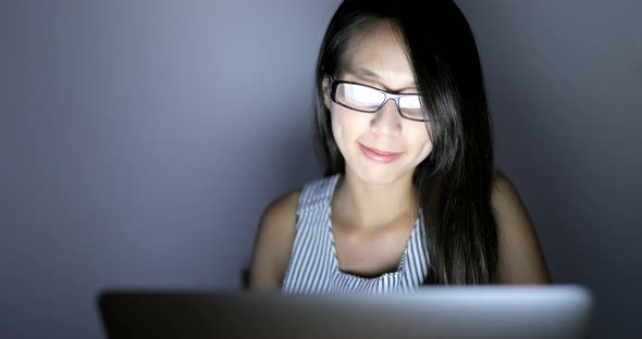 Woman using digital tablet computer at home 