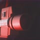 Close up of man in red lights holding vintage camera - VideoHive Item for Sale