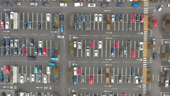 Aerial footage above a busy car park taken in the winter time in the town of Colton in Leeds