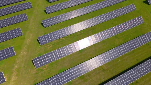 Solar Panels in Green Field Aerial View