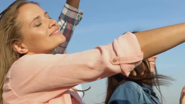 Beautiful Girls Dancing to Music, Enjoying Outdoor Summer Concert, Slow Motion