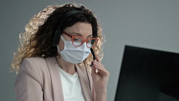 Call Center Operator in Medical Mask