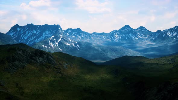 Mountains with Snow Capped Peaks in Summer