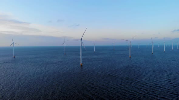 Windmill Park in the Ocean Drone Aerial View of Windmill Turbines Generating Green Energy Electric