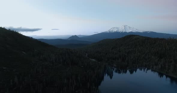 Aerial video of Mount Shasta and Castle Lake, wide panoramic drone footage