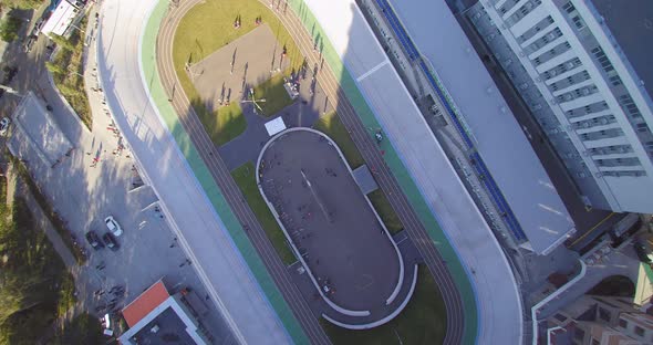 Open Velodrome in Kiev, Ukraine with cyclist training for the cycling race. Top aerial view