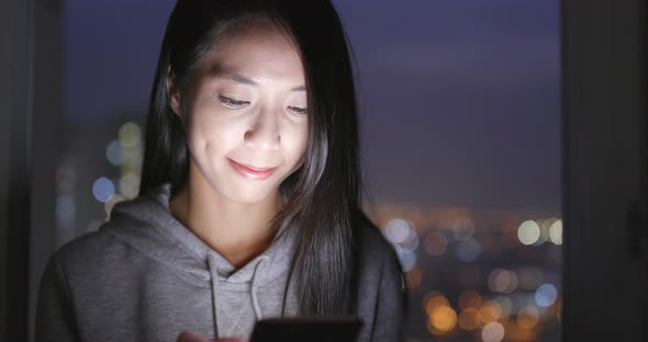 Young Woman Use of Smart Phone at Home