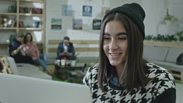 Hipster Woman Having Video Call with Business Partner