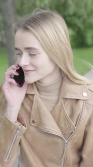 Vertical Video of a Young Skinny Girl in the Park