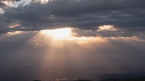 Heavenly Sun Rays Shining Through Clouds Zoom In Time Lapse