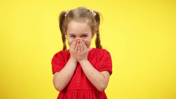 Funny Cute Little Shy Girl Laughing Closing Mouth with Hands