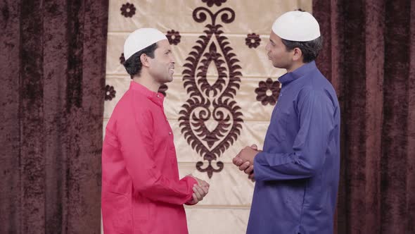 2 Muslim men talking