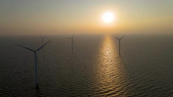 Wind Turbines in the Early Morning Wind Mill Park in the Netherlands