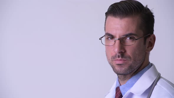 Profile View of Young Hispanic Man Doctor