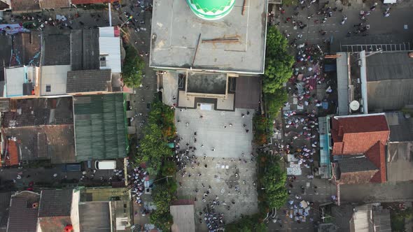 Aerial View of People offering prayers on the Eid morning at famous mosque Jama Masjid in Bekasi.