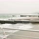 Storm in the Promenade Fenced with Concrete Breakwater in Cloudy Weather with a Leadgray Sky and - VideoHive Item for Sale