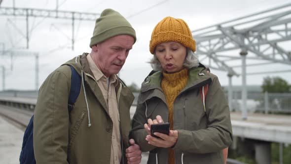 Senior Couple on Train Station