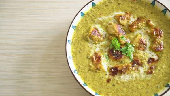 Afghani chicken in green curry or Hariyali tikka chicken hara masala - Indian food style