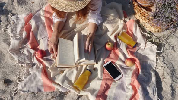 Girl Lying On A Beach And Reading A Book 4