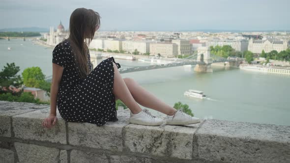 Young Woman and Panorama of Budapest with Danube River From High