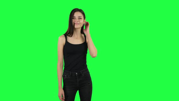 Young Girl Waving Hand and Showing Gesture Come Here. Green Screen