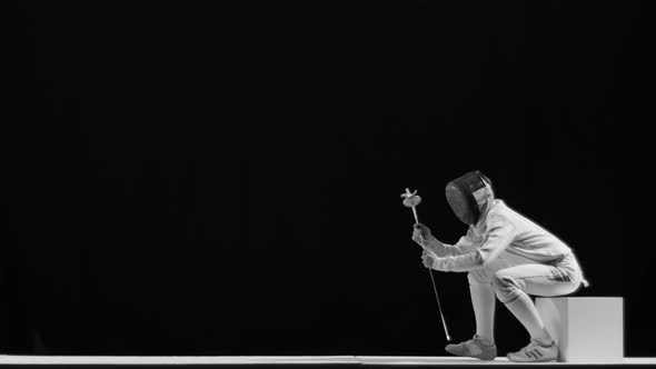 Fencer Standing on Knee While Surrender in Battle