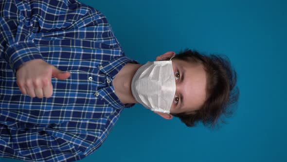 Boy Feeling Sick and Wearing Mask