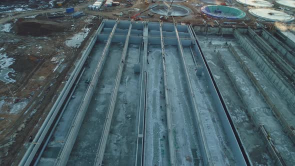 Empty Concrete Basins to Purify Water at Construction Site