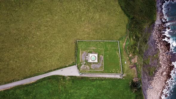 Aerial View of the Lighthouse and Cape Lastres. Bay of Biscay in Northern Spain in Summer