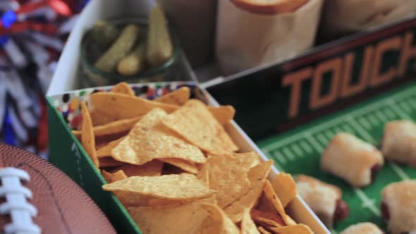 Football Snack Stadium filled with sub sandwiches, veggies and chips.